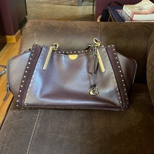 Blood color Coach. Like new.